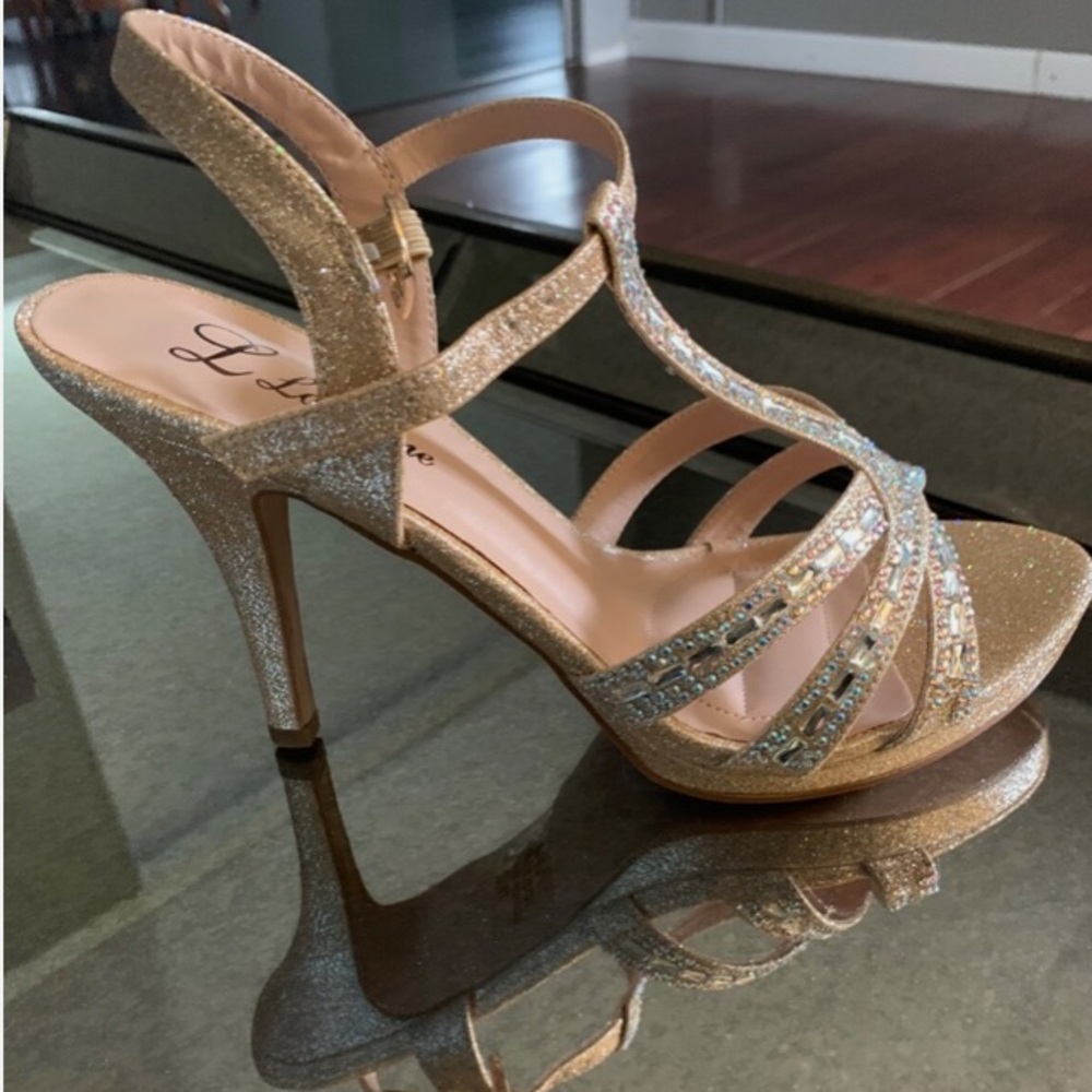 Georgeous Silver Glitter Strap buckle Heels, size 8 wide, pre owned $15.00